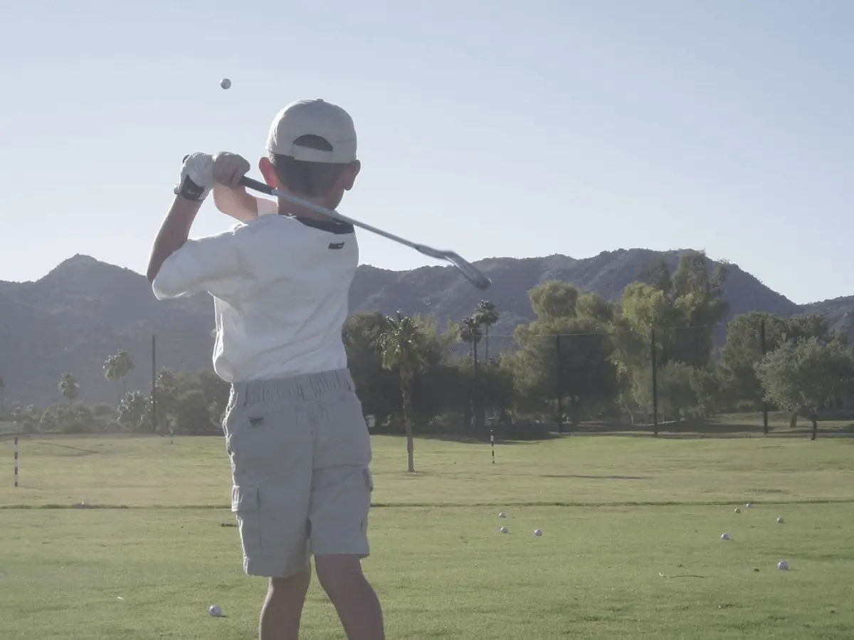 Young golf player who is trying the longest golf ball